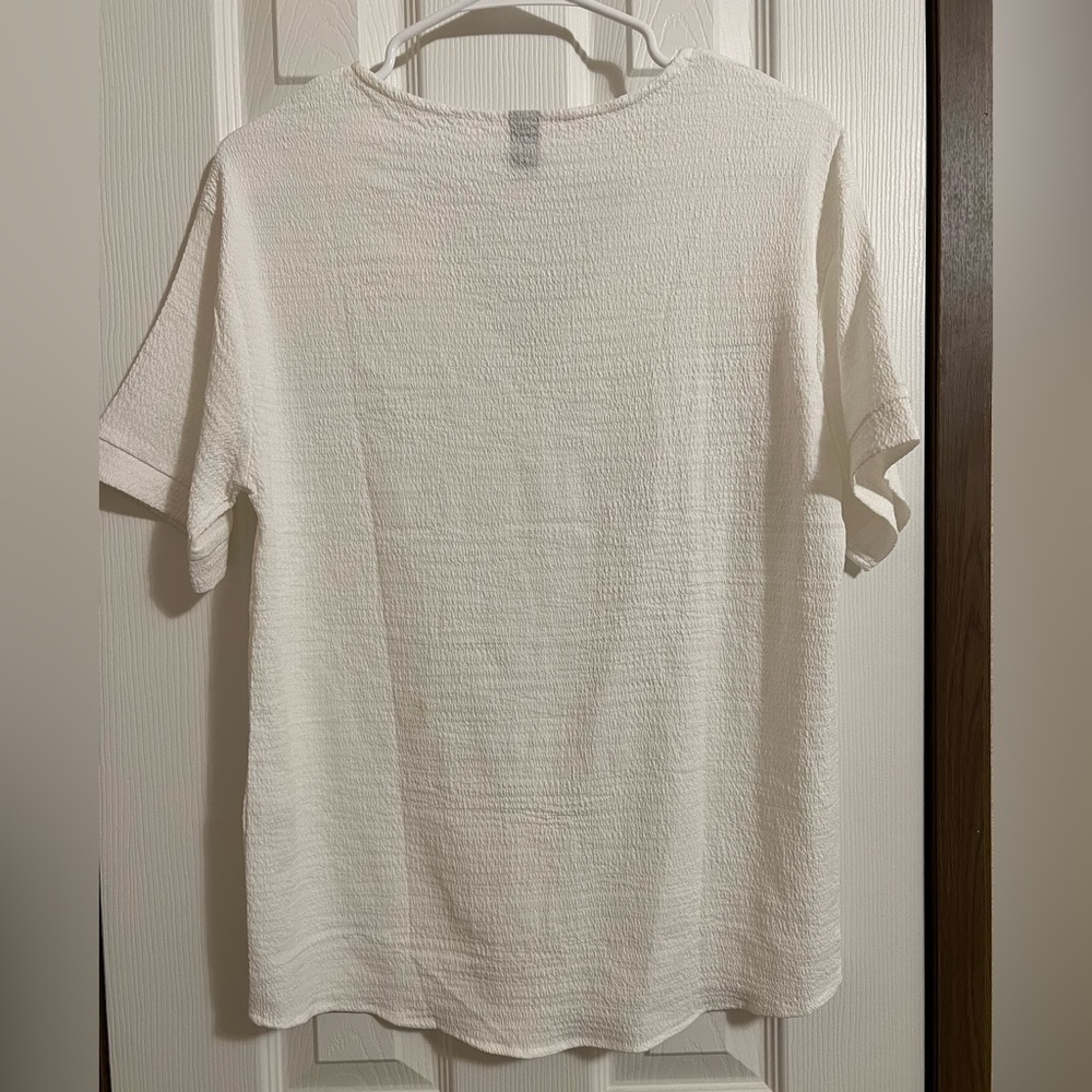 Women’s white button up blouse